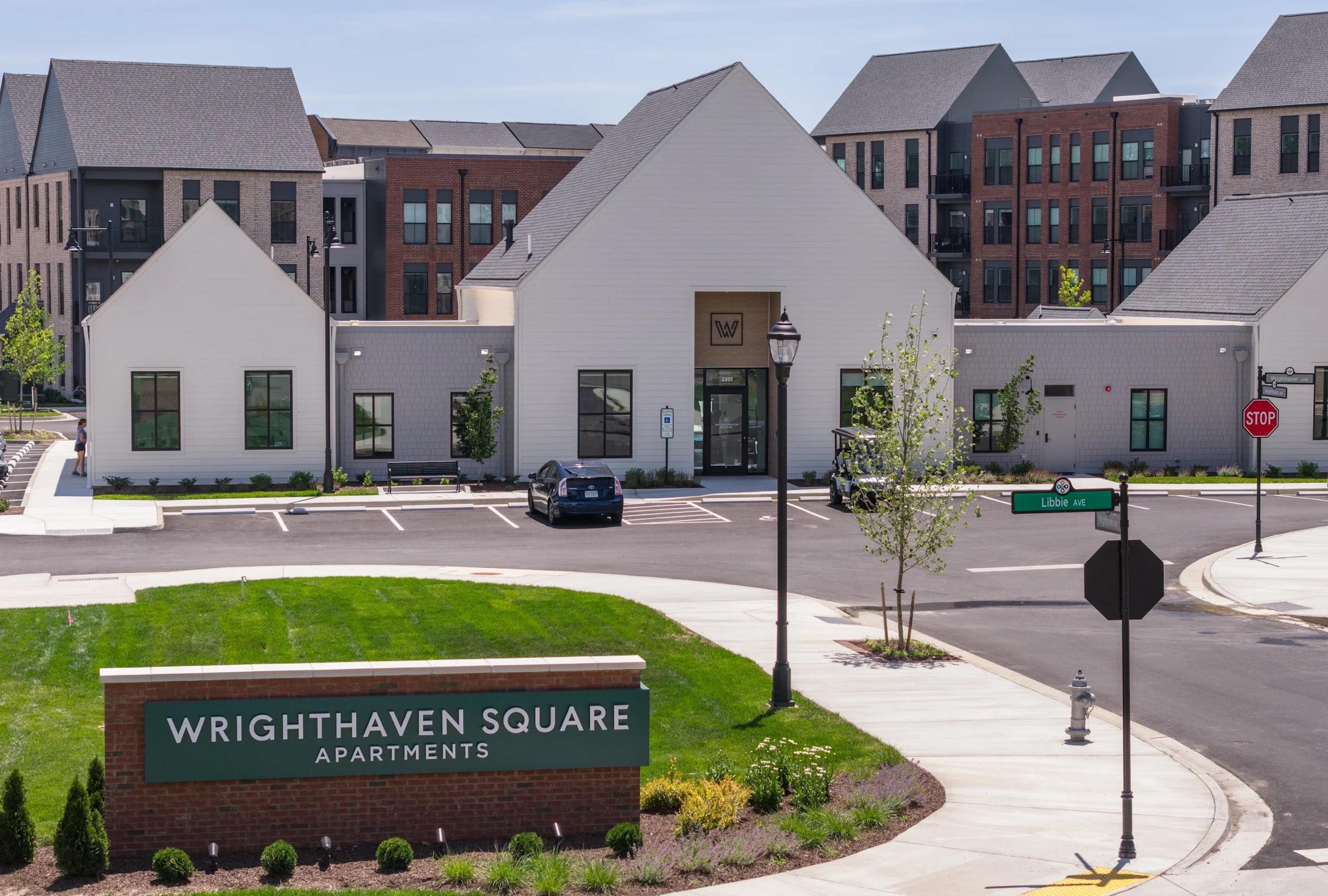 Wrighthaven Square Apartments entrance sign in front of the clubhouse